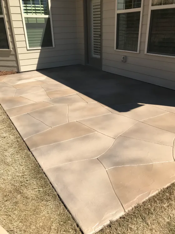 Custom stained concrete surface with rich, layered color in Georgia