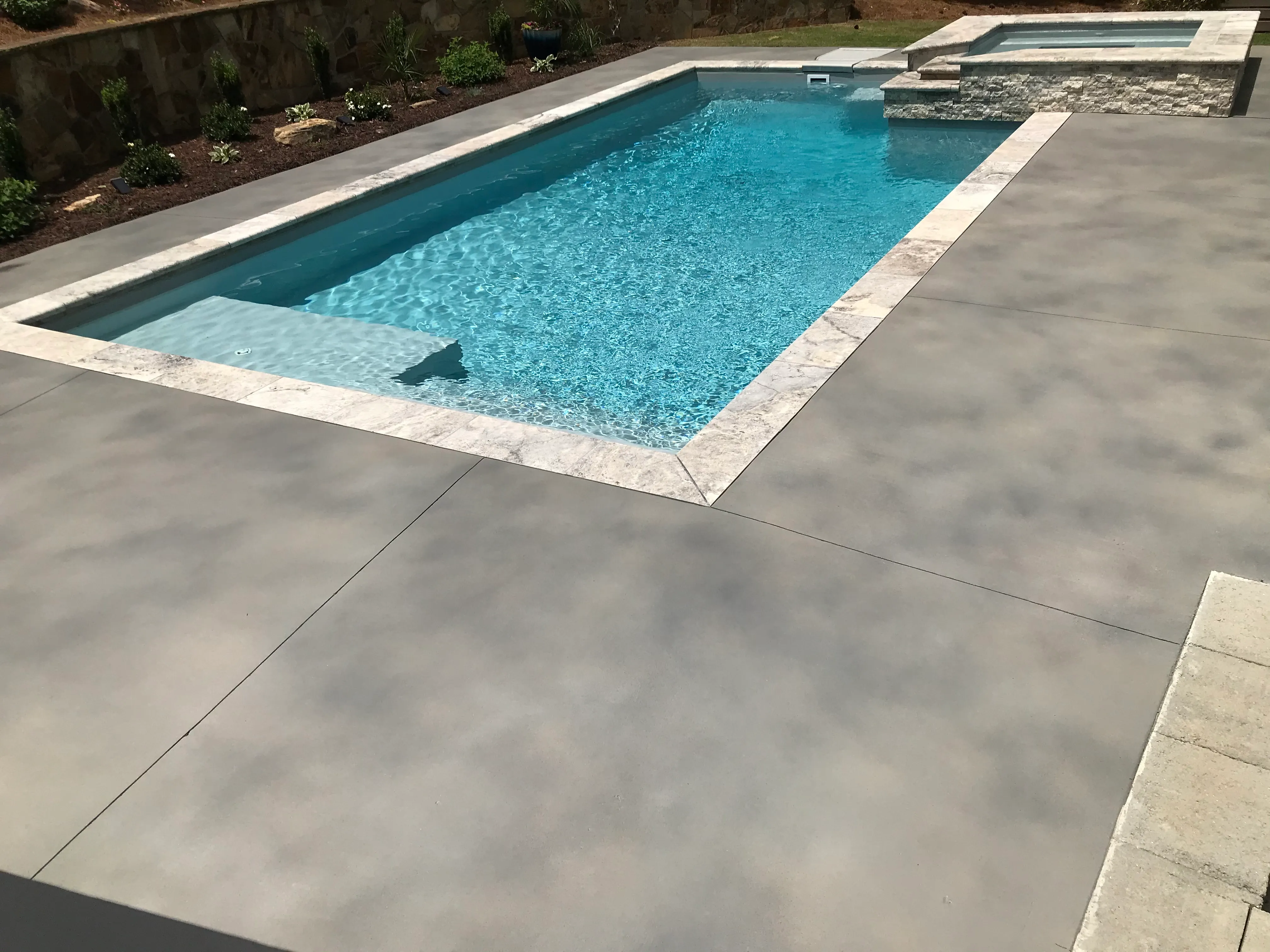 Stained concrete pool deck by JP Concrete Creations in metro Atlanta, GA