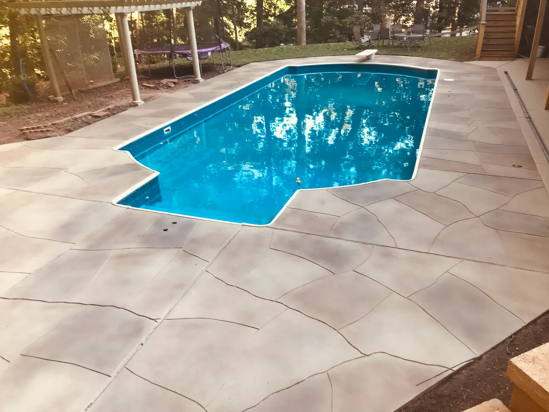 After: stained concrete patio project 1 by JP Concrete Creations, Kennesaw GA