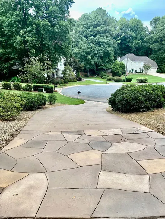 Custom stained concrete driveway with a rich, durable finish